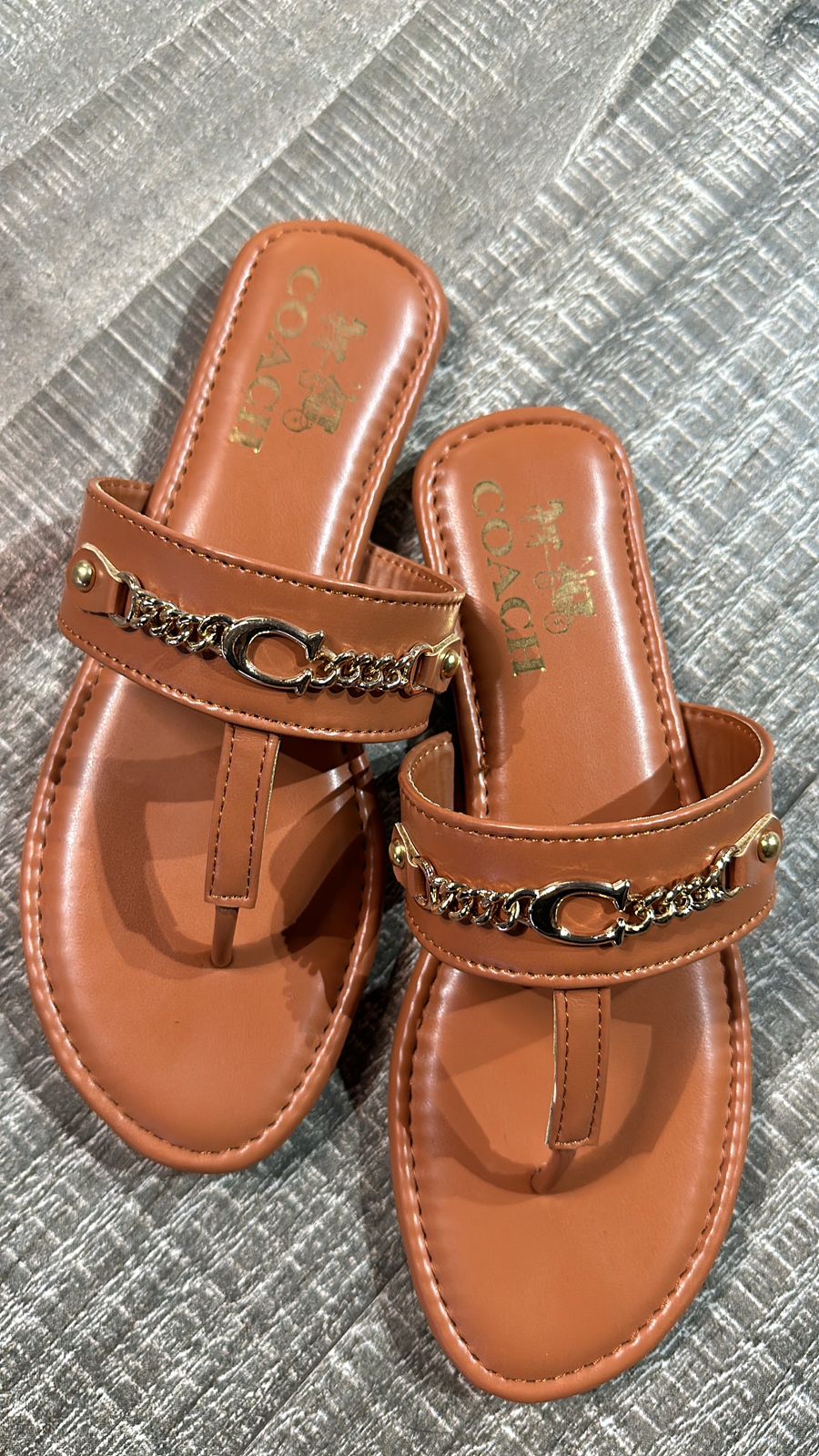Beige coach chain Flats