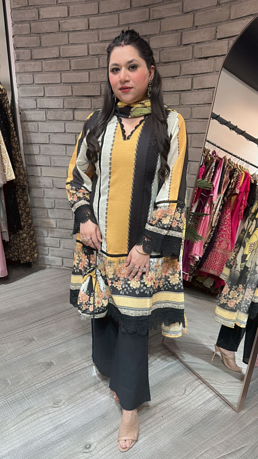 Reva Black Yellow peplum suit