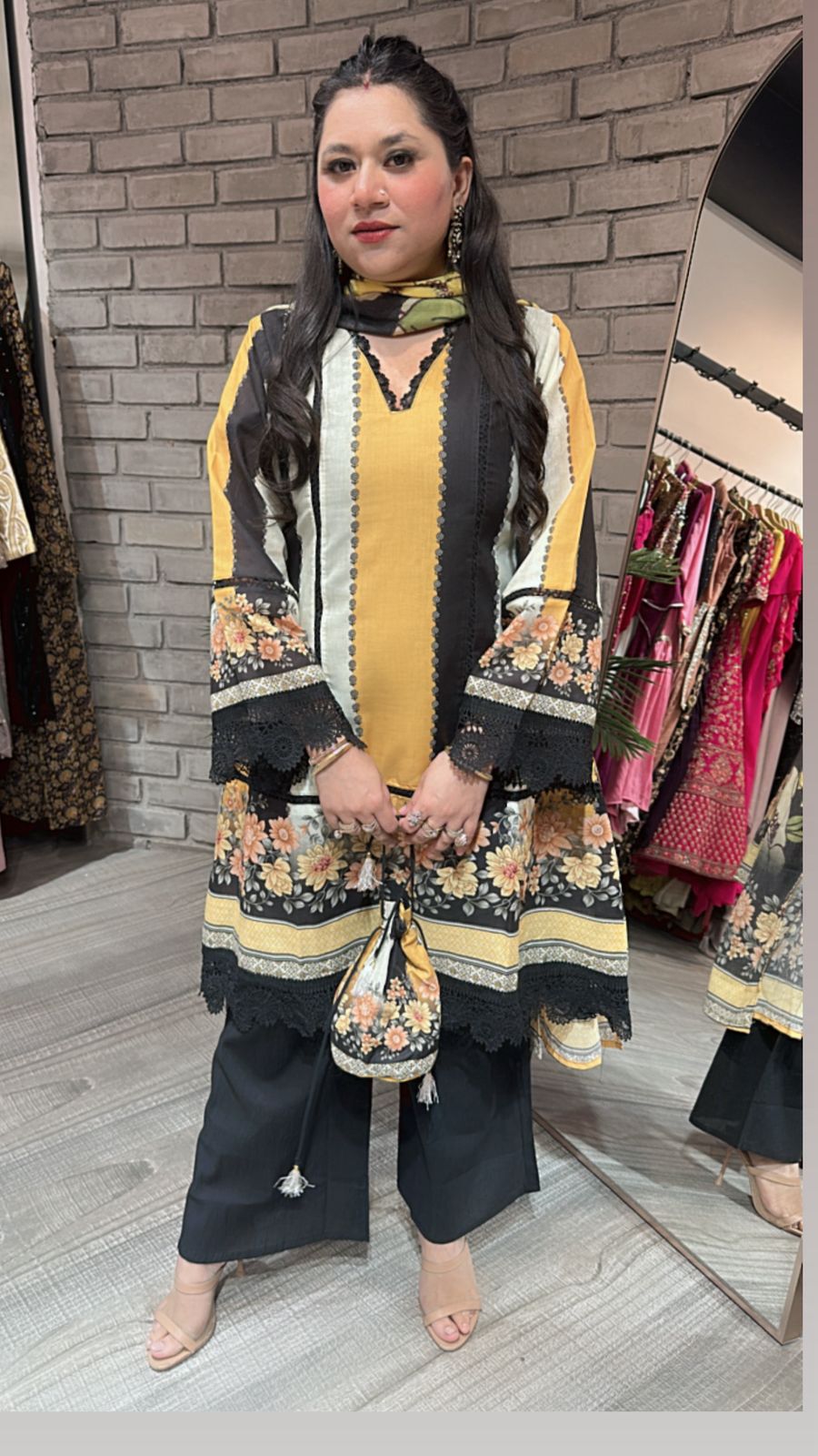 Reva Black Yellow peplum suit