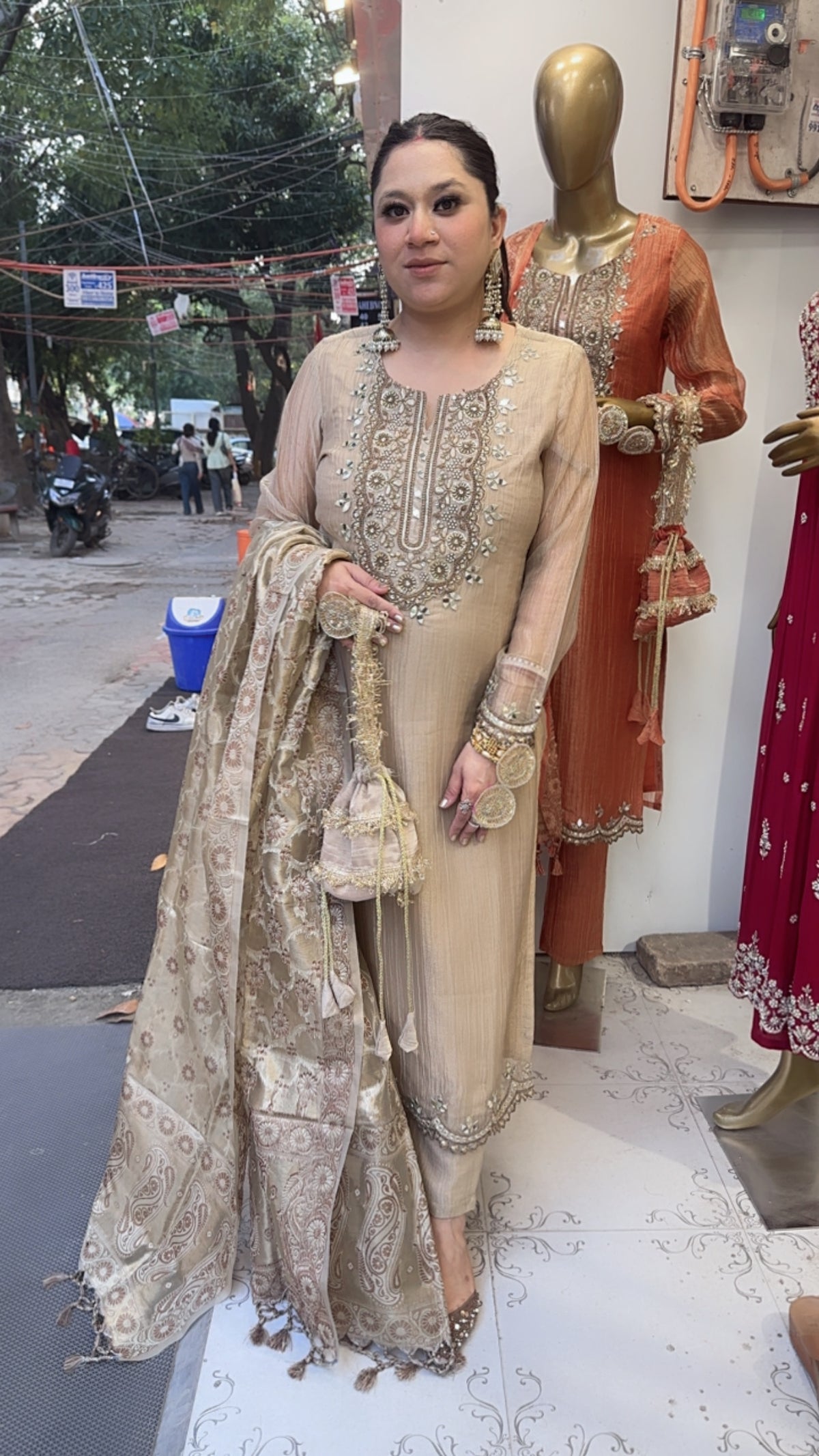 Kesariya Golden Karwa with potli Designer Suit