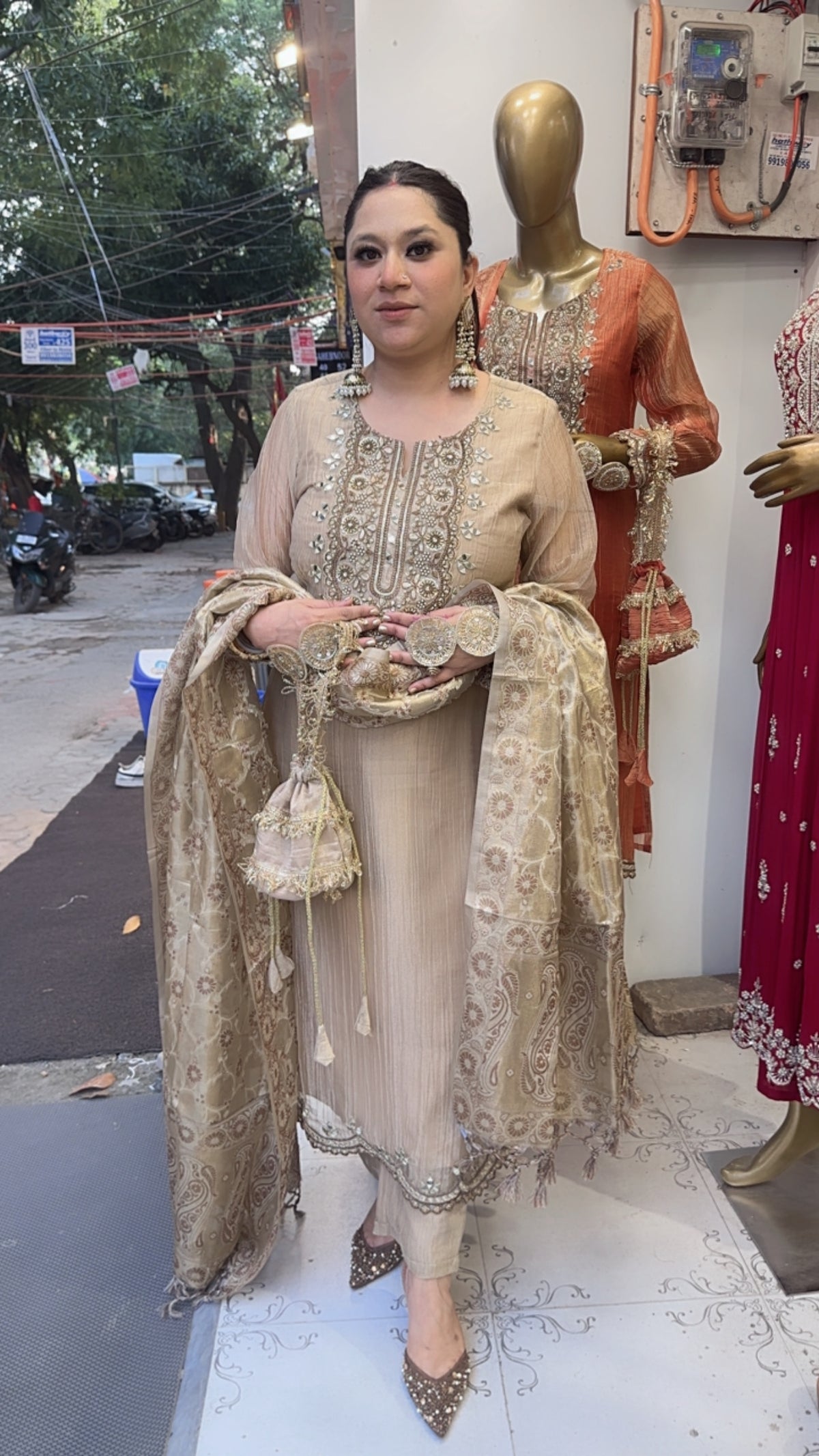 Kesariya Golden Karwa with potli Designer Suit
