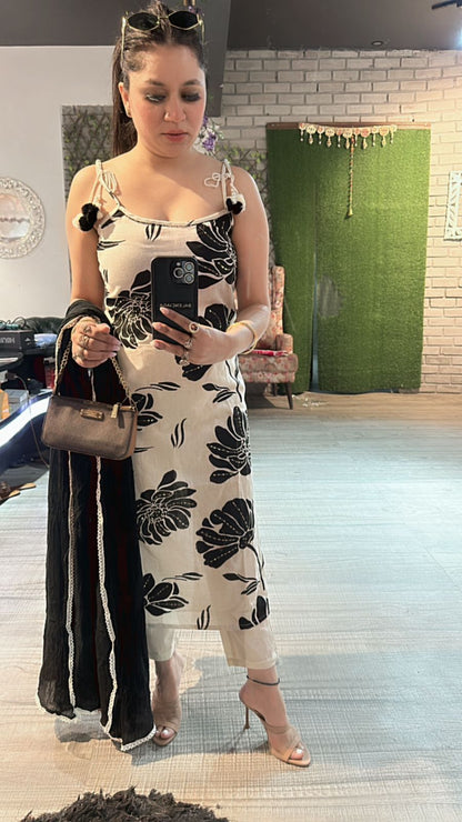 Niharika Black white strapy suit