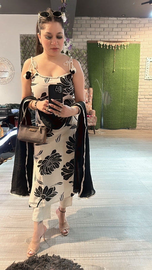 Niharika Black white strapy suit