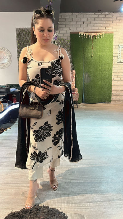 Niharika Black white strapy suit