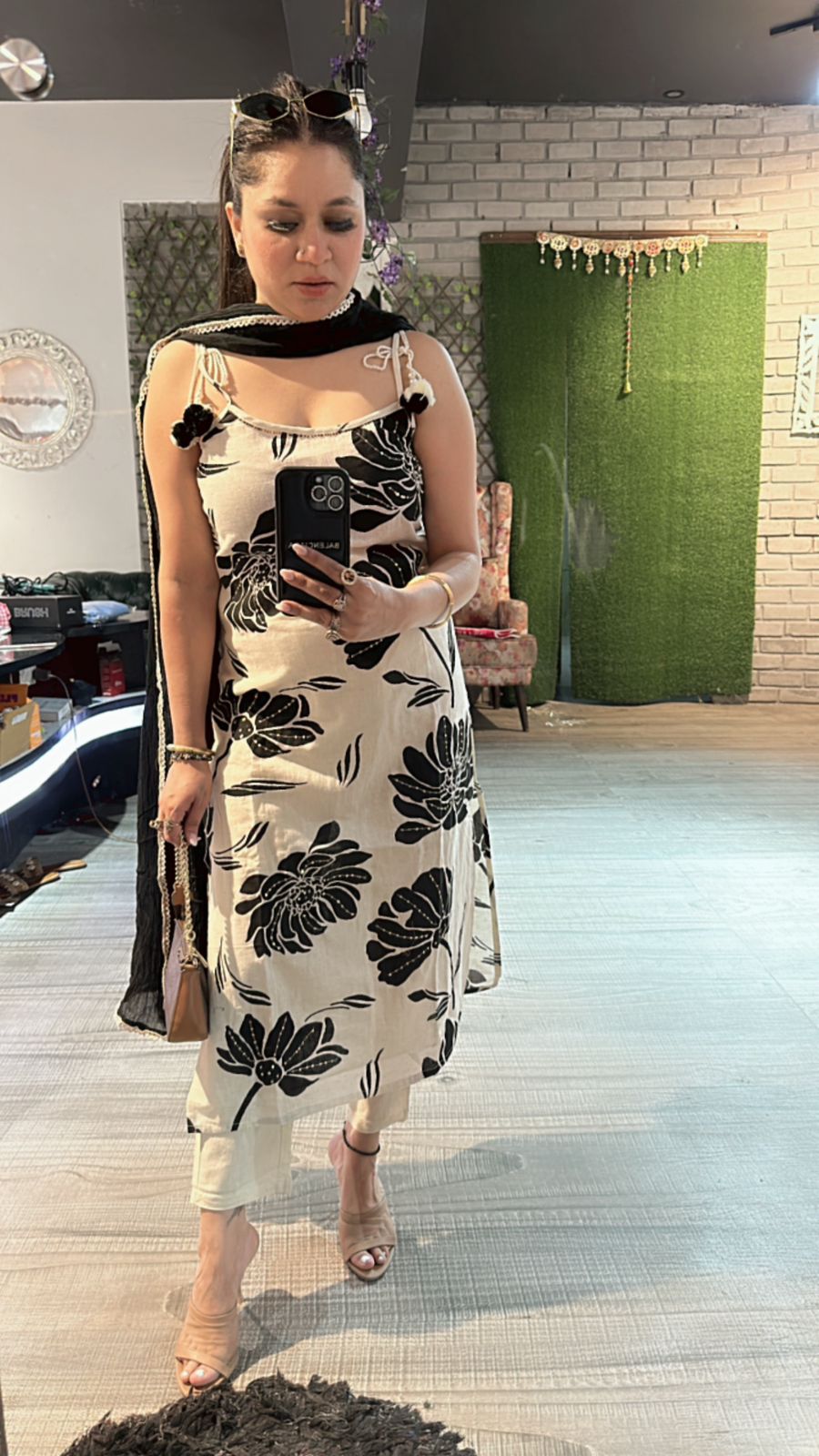 Niharika Black white strapy suit