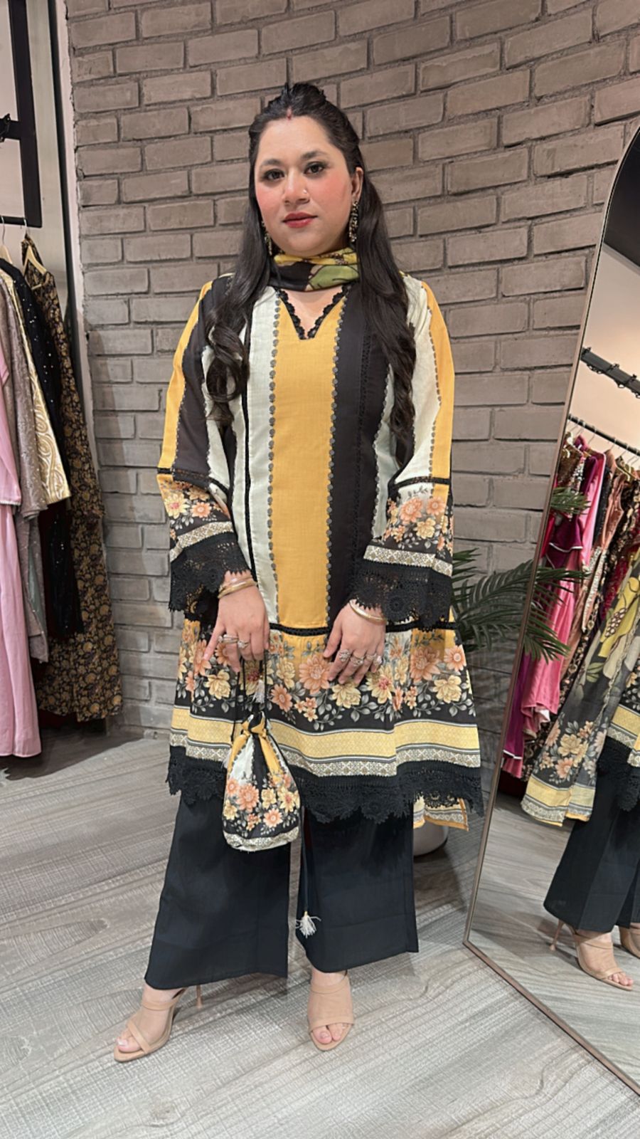 Reva Black Yellow peplum suit