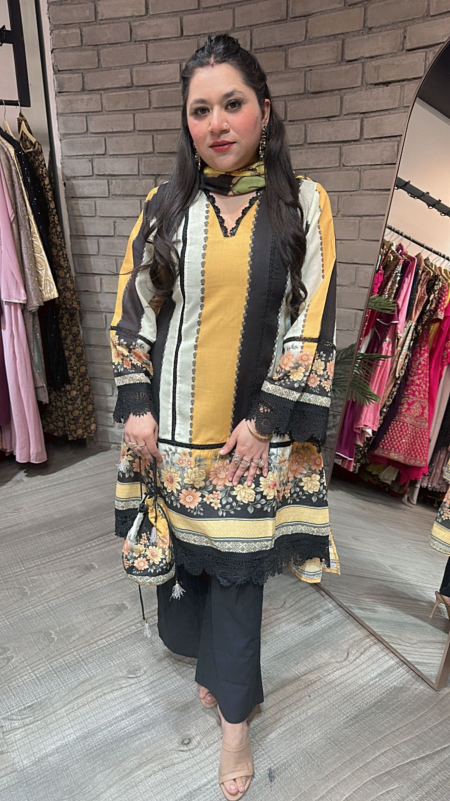 Reva Black Yellow peplum suit