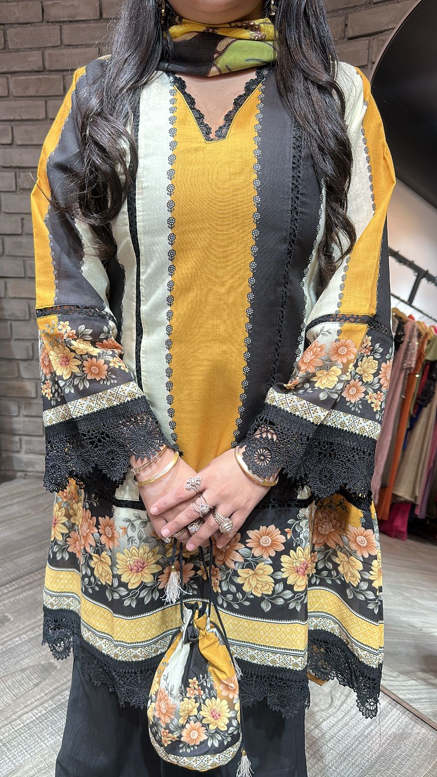 Reva Black Yellow peplum suit
