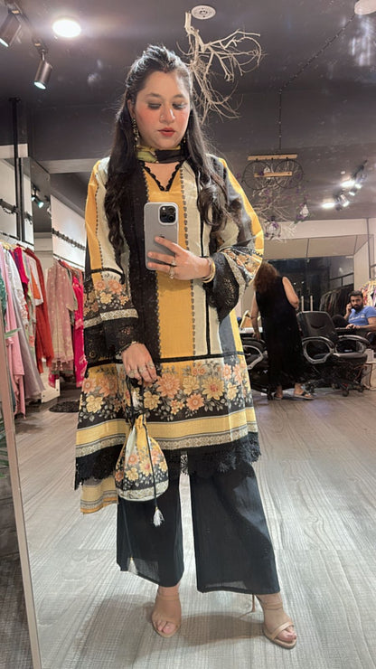 Reva Black Yellow peplum suit