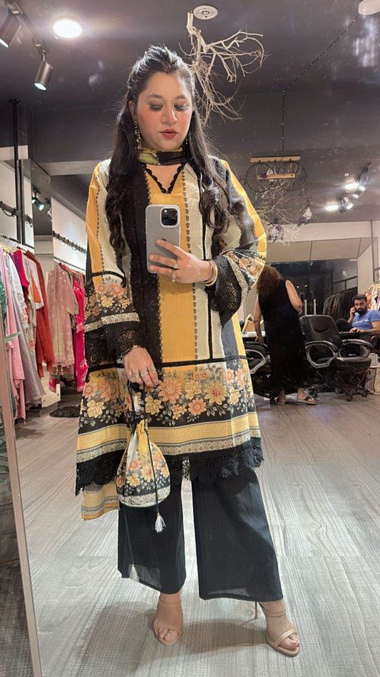 Reva Black Yellow peplum suit