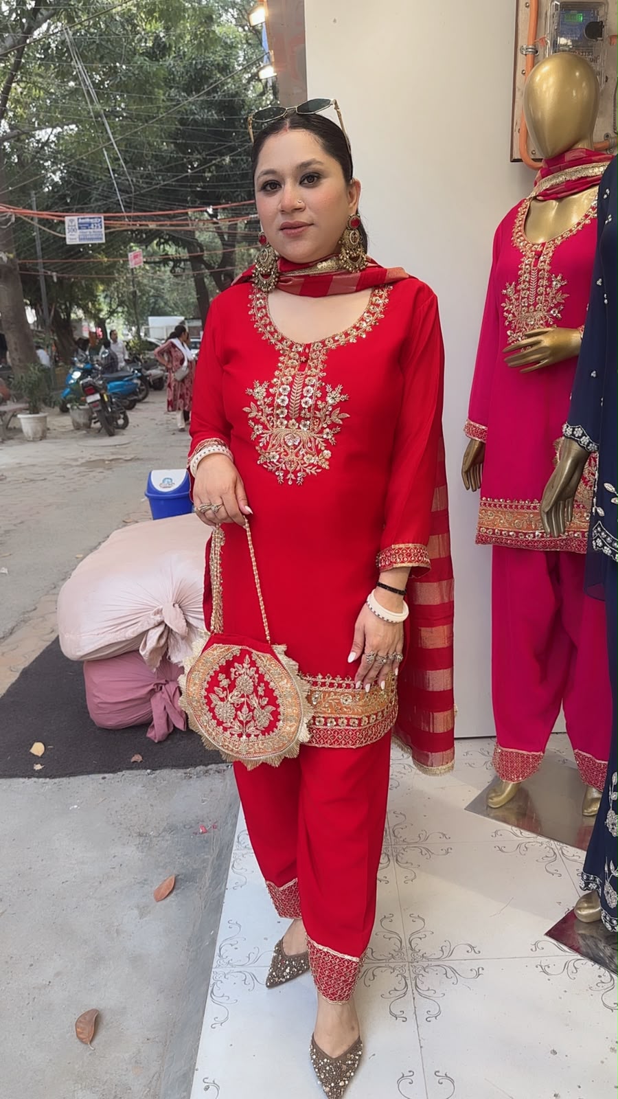 Biwi Red Embroidered Designer Suit with potli