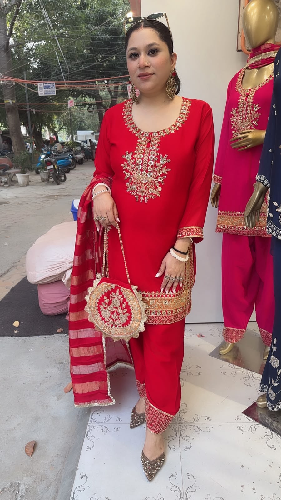 Biwi Red Embroidered Designer Suit with potli