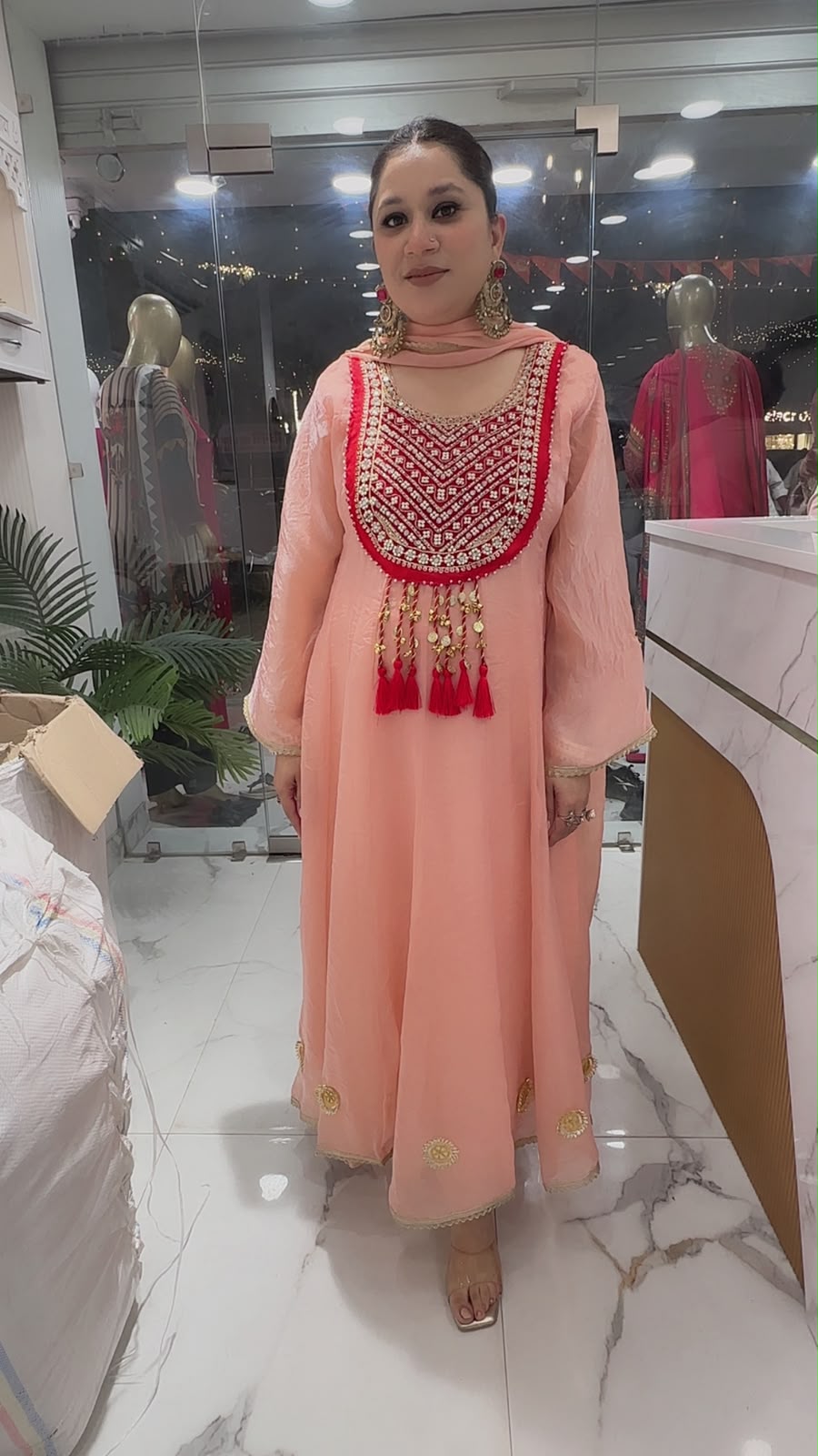 Sehar peach Gungru Tassel Designer Anarkali Suit