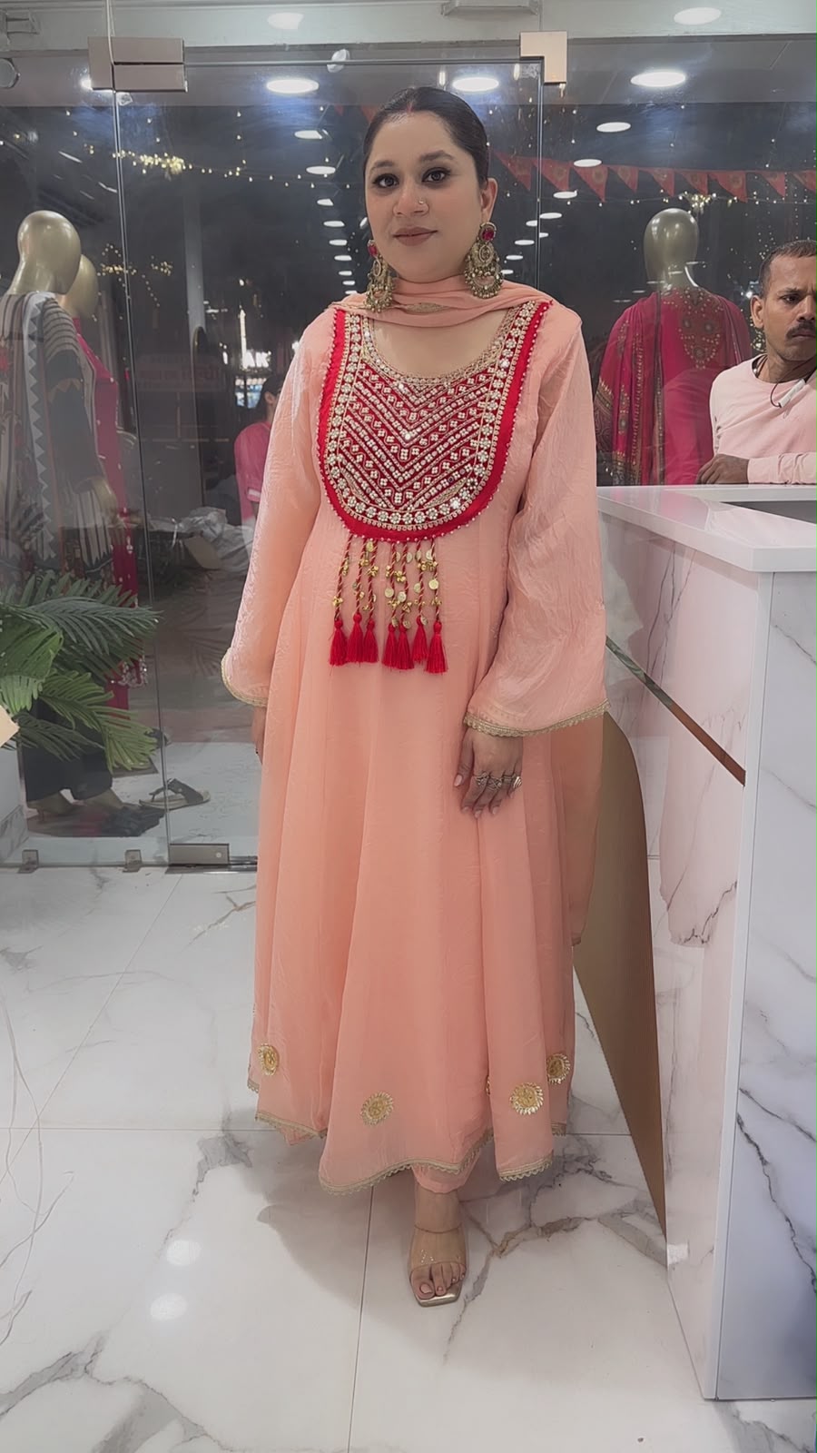 Sehar peach Gungru Tassel Designer Anarkali Suit
