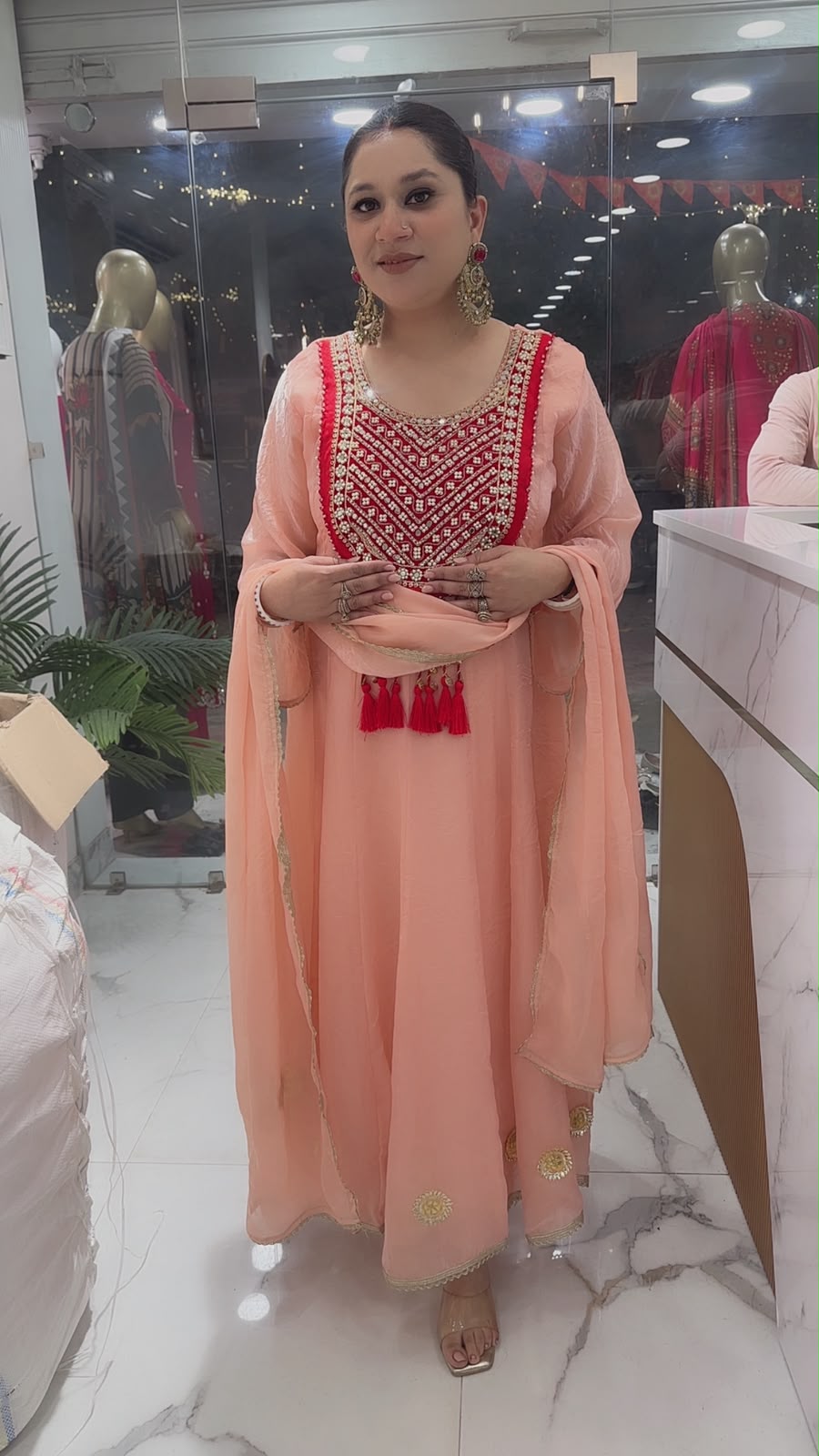 Sehar peach Gungru Tassel Designer Anarkali Suit